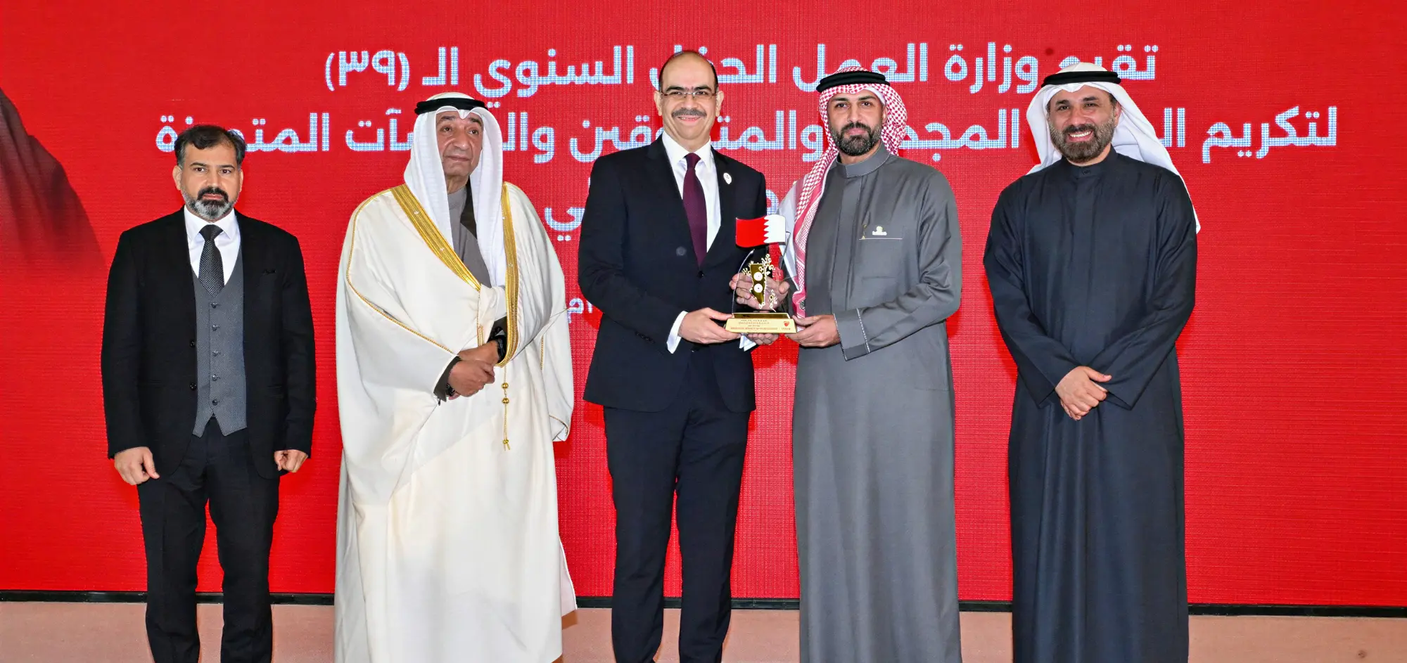 Excellence Award presented to Mr.Nabeel Rhadhi by the Ministry of Labour
